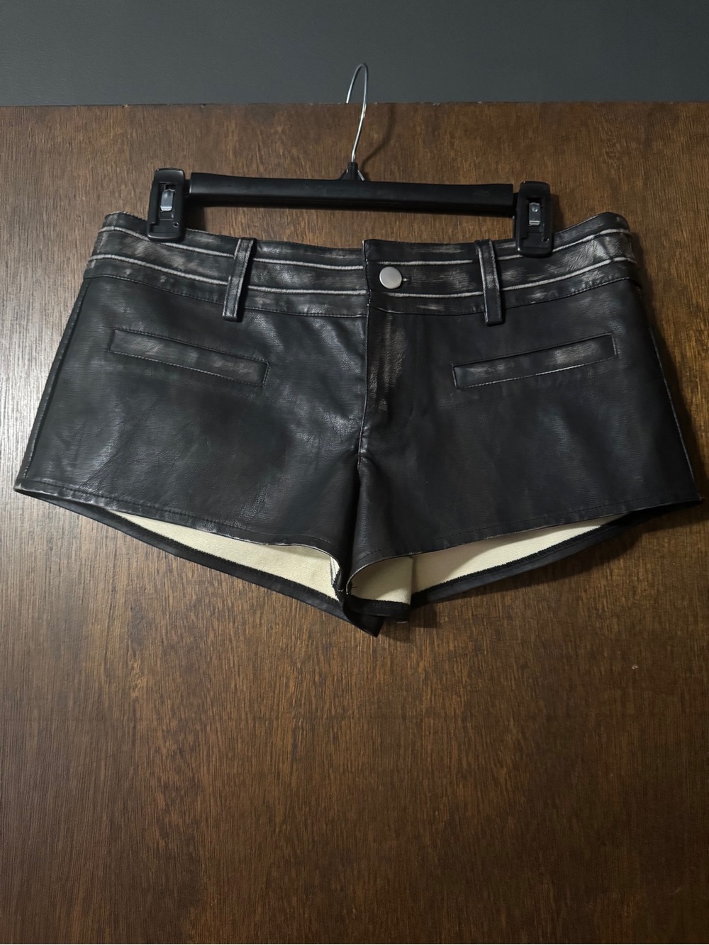 Distressed faux leather shorts M
